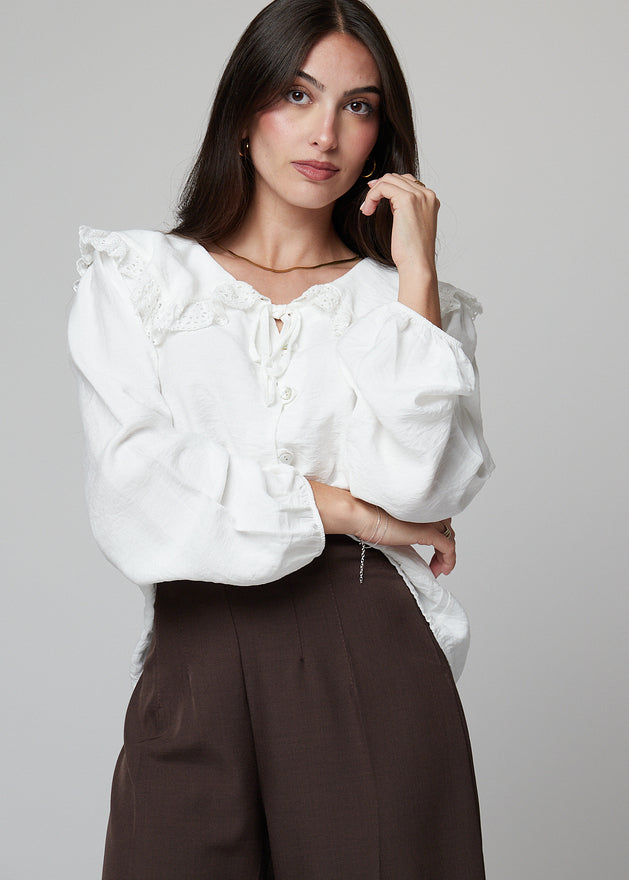 BLUSA COM GOLA DE BEBÉ