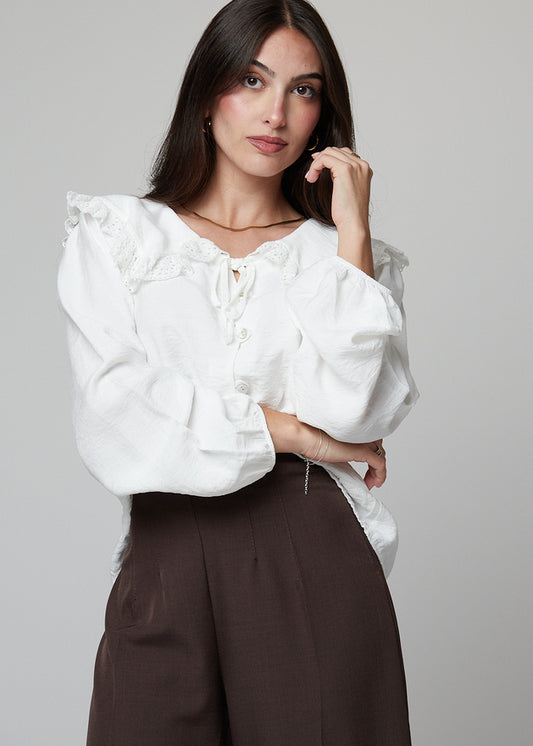 BLUSA COM GOLA DE BEBÉ